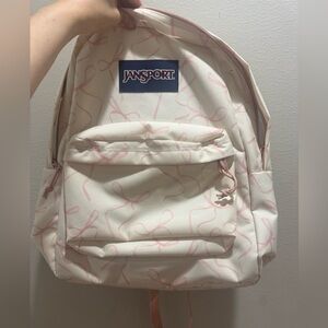 Jansport backpack with coquette bows